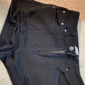 Distressed black denim shorts